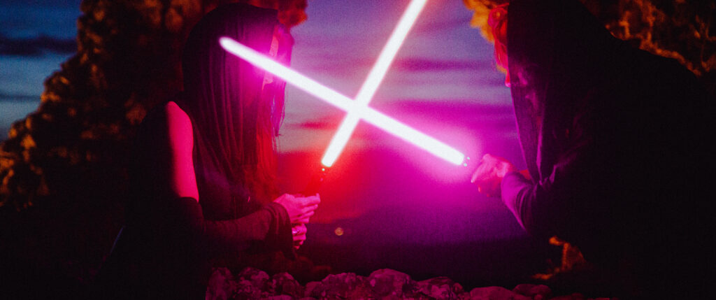 Two Siths dueling with lightsabers in middle of some ruins, from my Star Wars editorial