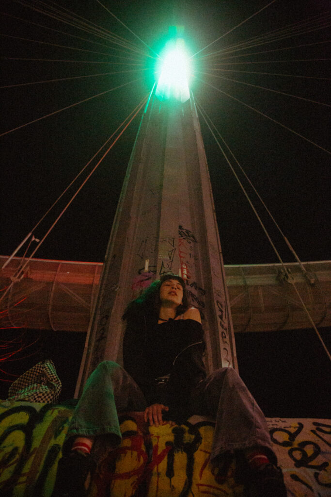 night low angle portrait of a girl. pro-mist filter