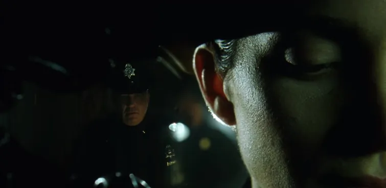 still frame from The Matrix shot with a split diopter filter